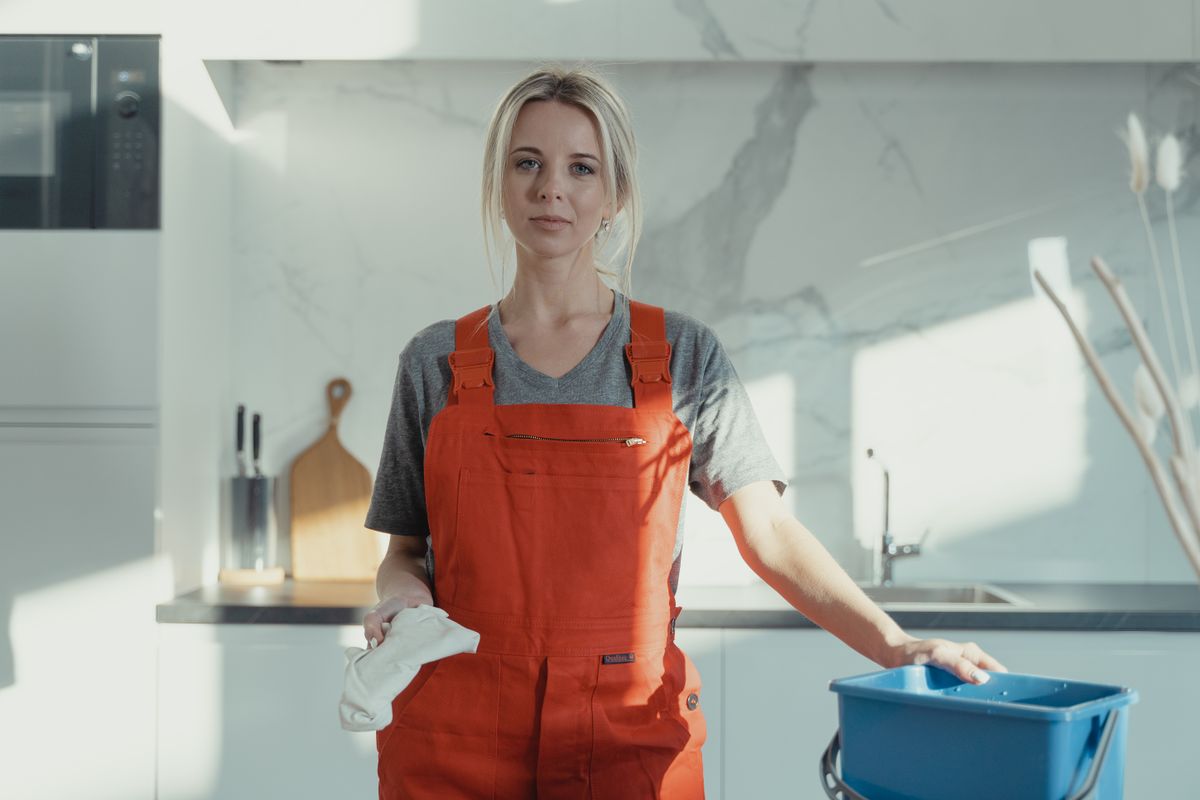 Cleaning bucket and cloth in a kitchen