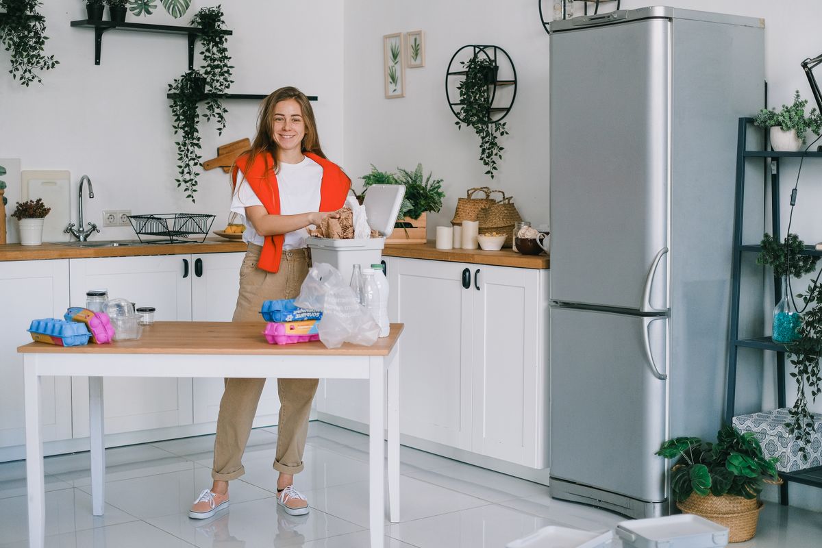 Sorting household recycling in a kitchen