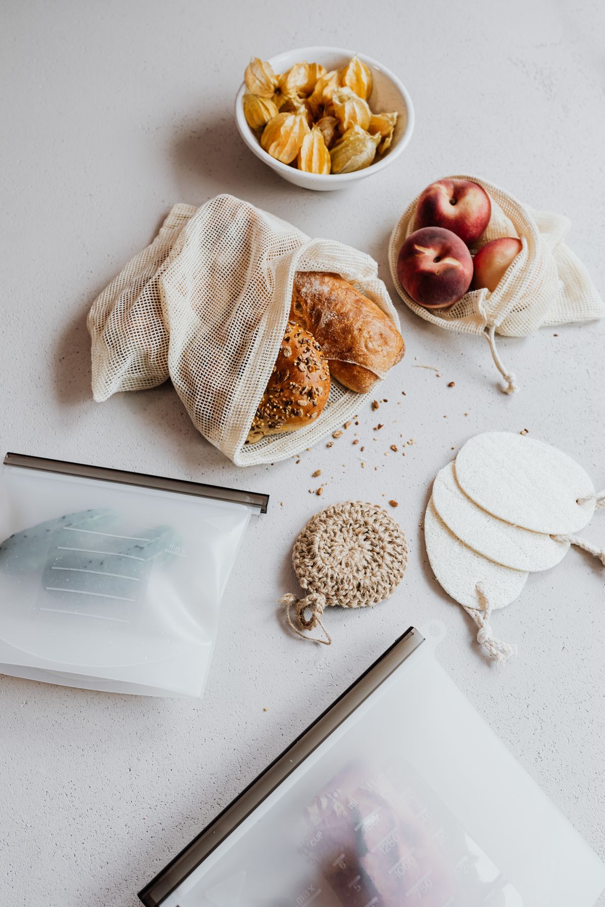 Reusable bags and food on a kitchen surface